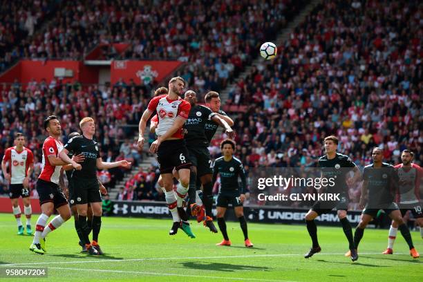 Southampton's Dutch defender Wesley Hoedt heads the ball during the English Premier League football match between Southampton and Manchester City at...