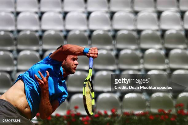 Ryan Harrison of the USA serves in his match against Yuichi Sugita of Japan during day one of the Internazionali BNL d'Italia 2018 tennis at Foro...