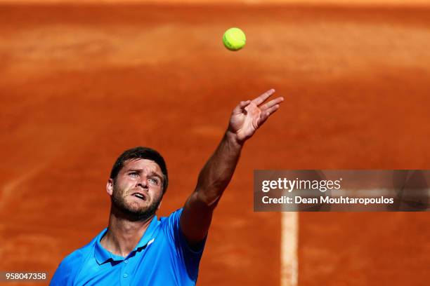 Ryan Harrison of the USA serves in his match against Yuichi Sugita of Japan during day one of the Internazionali BNL d'Italia 2018 tennis at Foro...