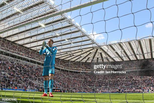 Newcastle keeper Martin Dubravka applauds the fans during the Premier League match between Newcastle United and Chelsea at St. James Park on May 13,...