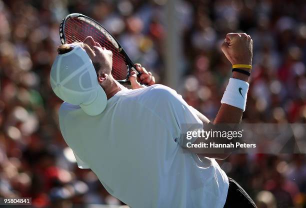 John Isner of USA celebrates winning the final match against Arnaud Clement of France during day six of the Heineken Open at the ASB Tennis Centre on...