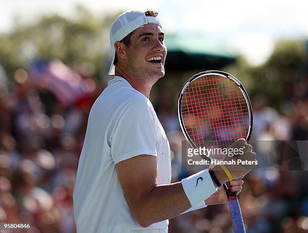 John Isner of USA celebrates winning the final match against Arnaud Clement of France during day six of the Heineken Open at the ASB Tennis Centre on...