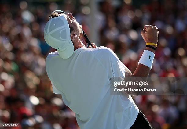 John Isner of USA celebrates winning the final match against Arnaud Clement of France during day six of the Heineken Open at the ASB Tennis Centre on...