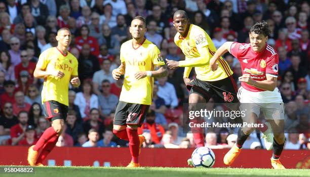 Alexis Sanchez of Manchester United in action with Abdoulaye Doucoure of Watford during the Premier League match between Manchester United and...