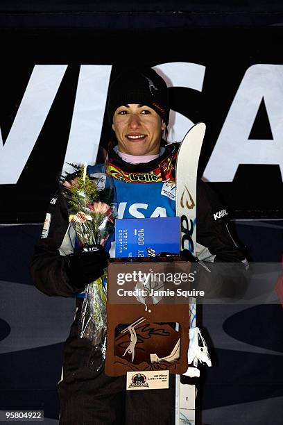 Lydia Lassila of Australia stands on the top of the podium after winning gold in the Ladies Aerial finals during the 2010 FIS Freestyle Skiing World...