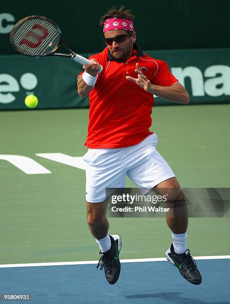 Arnaud Clement of France plays a forehand in his final match against John Isner of the USA during day six of the Heineken Open at the ASB Tennis...