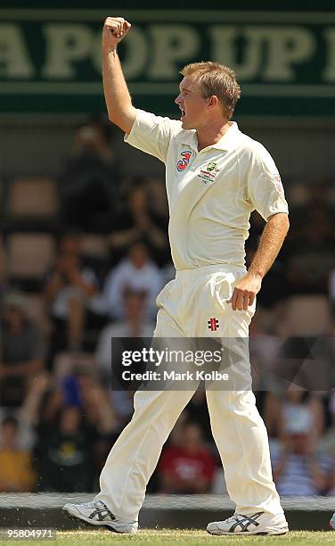 Nathan Hauritz of Australia celebrates taking the wicket of Shoaib Malik of Pakistan during day three of the Third Test match between Australia and...