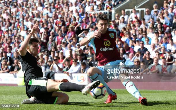 Emerson Hyndman of AFC Bournemouth and Matthew Lowton of Burnley during the Premier League match between Burnley and AFC Bournemouth at Turf Moor on...