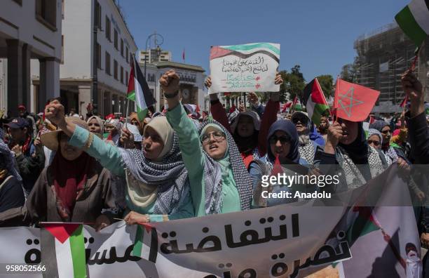 Group of people gather during a demonstration in support of the "Great March of Return", which was organized to mark the 42nd anniversary of the Land...
