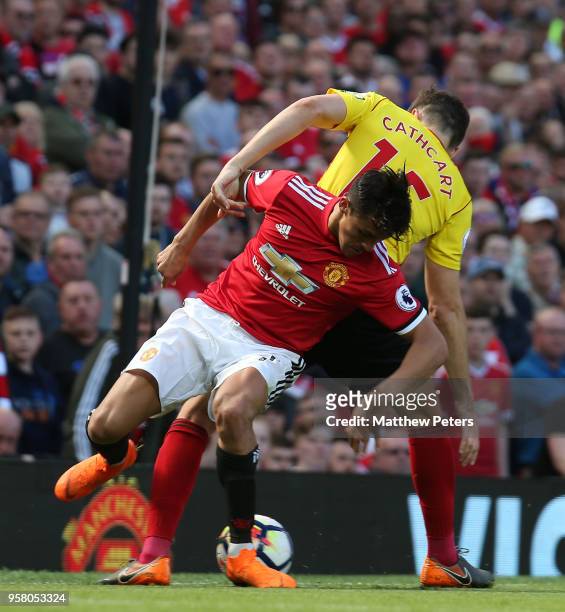 Alexis Sanchez of Manchester United in action with Craig Cathcart of Watford during the Premier League match between Manchester United and Watford at...