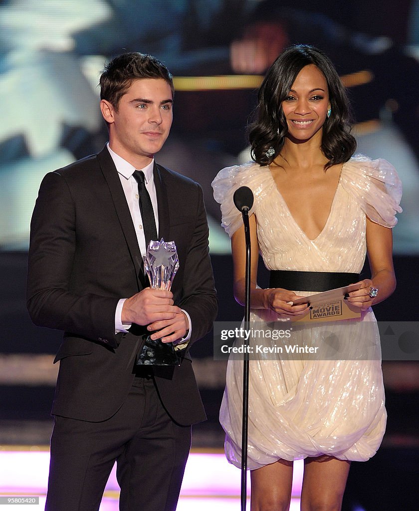 Actor Zac Efron And Zoe Saldana Present The Best Song Award Onstage actor-zac-efron-and-zoe-saldana-present-the-best-song-award-onstage