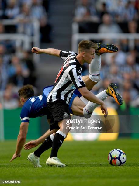 Chesea defender Gary Cahill challenges Matt Ritchie of Newcastle during the Premier League match between Newcastle United and Chelsea at St. James...