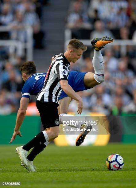 Chesea defender Gary Cahill challenges Matt Ritchie of Newcastle during the Premier League match between Newcastle United and Chelsea at St. James...