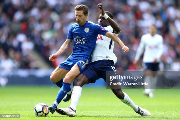 Moussa Sissoko of Tottenham Hotspur tackles Adrien Silva of Leicester City during the Premier League match between Tottenham Hotspur and Leicester...
