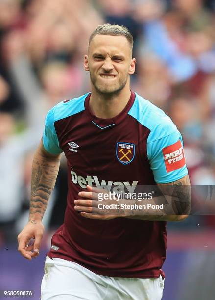 Marko Arnautovic of West Ham United celebrates after scoring his sides second goal during the Premier League match between West Ham United and...