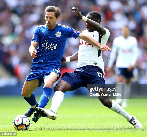 Moussa Sissoko of Tottenham Hotspur tackles Adrien Silva of Leicester City during the Premier League match between Tottenham Hotspur and Leicester...