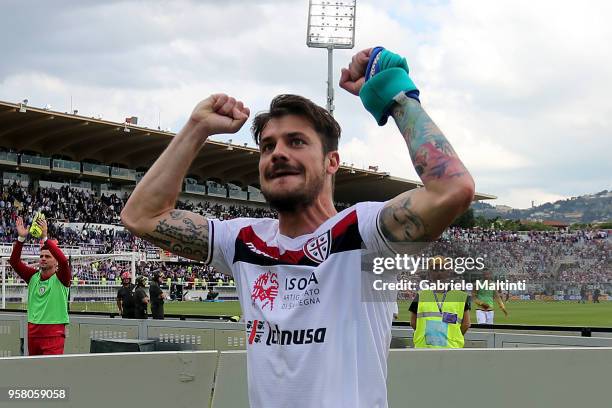 Daniele Dessena of Cagliari Calcio greets fans after the Serie A match during the serie A match between ACF Fiorentina and Cagliari Calcio at Stadio...