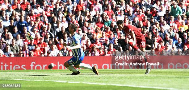 Dominic Solanke of Liverpool scores the third goal during the Premier League match between Liverpool and Brighton and Hove Albion at Anfield on May...
