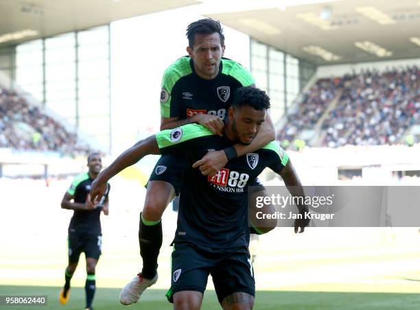 Joshua King of AFC Bournemouth celebrates with Charlie Daniels of AFC Bournemouth after scoring his sides first goal during the Premier League match...