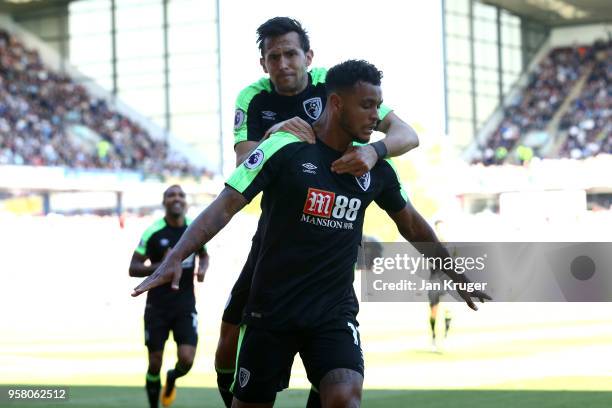 Joshua King of AFC Bournemouth celebrates with Charlie Daniels of AFC Bournemouth after scoring his sides first goal during the Premier League match...