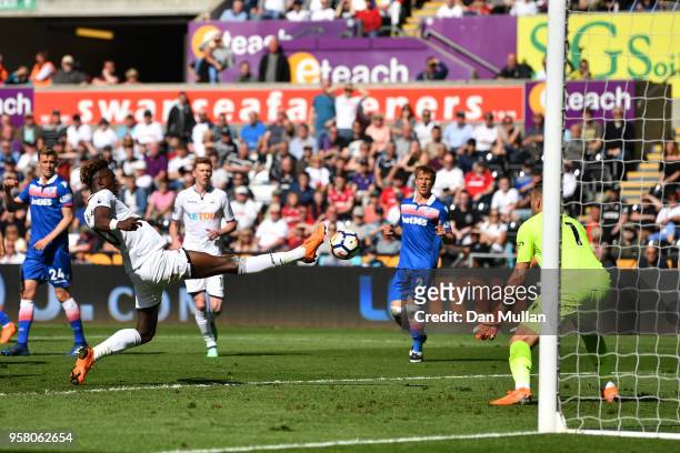 Tammy Abraham of Swansea City shoots during the Premier League match between Swansea City and Stoke City at Liberty Stadium on May 13, 2018 in...
