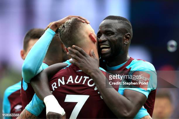 Marko Arnautovic of West Ham United celebrates with Cheikhou Kouyate of West Ham United after scoring his sides second goal during the Premier League...