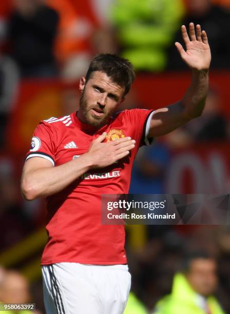 Michael Carrick of Manchester United shows appreciation to the fans during the Premier League match between Manchester United and Watford at Old...