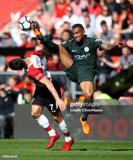 Danilo of Manchester City controls the ball as Shane Long of Southampton looks on during the Premier League match between Southampton and Manchester...