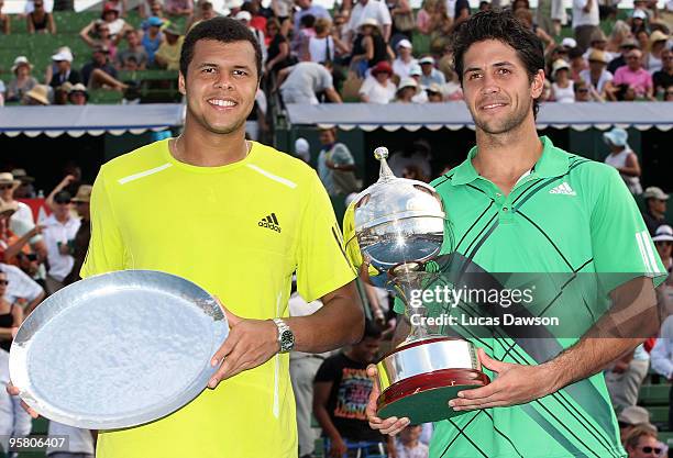 Runner Up Jo-Wilfried Tsonga of France and winner Fernando Verdasco of Spain hold up there trophies on during day four of the 2010 Kooyong Classic at...