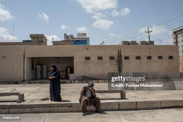 Voters head to polling stations to cast their vote for the Iraqi parliamentary election on May 12, 2018 in Erbil, Iraq. Citizens are voting in the...