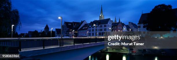 skyline view of ulm at dusk - ulmer münster stock-fotos und bilder