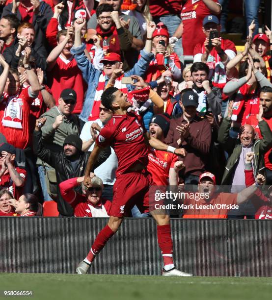Dominic Solanke of Liverpool celebrates after scoring the third goal for his team during the Premier League match between Liverpool and Brighton and...