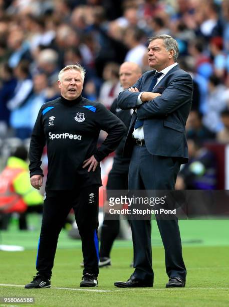 Sam Allardyce, Manager of Everton and Assisant Sammy Lee looks on during the Premier League match between West Ham United and Everton at London...