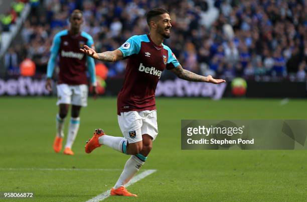 Manuel Lanzini of West Ham United celebrates scoring his sides third goal during the Premier League match between West Ham United and Everton at...