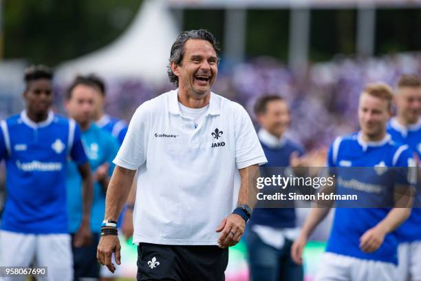 Head coach Dirk Schuster of Darmstadt celebrates winning after the Second Bundesliga match between SV Darmstadt 98 and FC Erzgebirge Aue at...