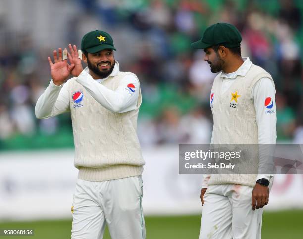 Dublin , Ireland - 13 May 2018; Azhar Ali, left, and Babar Azam of Pakistan leave the field following the fall of Ireland's final wicket during day...