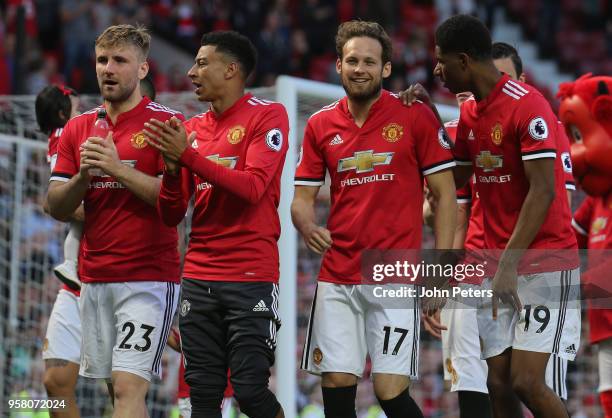 Luke Shaw, Jesse Lingard, Daley Blind and Marcus Rashford of Manchester United take part in a lap of honour after the Premier League match between...