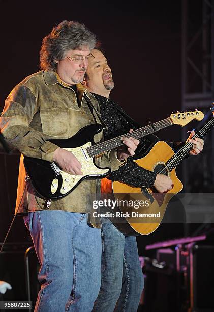 Greg Jennings and Singer/Songwriter Larry Stewart of Restless Heart performs at the Country Crossing Grand Opening Kick-Off Celebration at Country...
