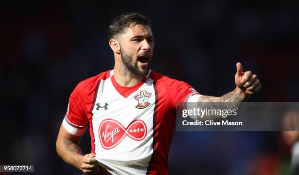 Charlie Austin of Southampton reacts at the full time whistle as his team avoid the relegation the Premier League match between Southampton and...