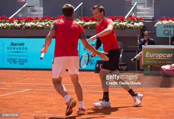 Nikola Mektic of Croatia and Alexander Peya of Austria celebrate winning a point in action against Bob Bryan and Mike Bryan of The United States in...