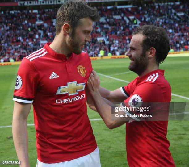 Michael Carrick of Manchester United talks to Juan Mata after the Premier League match between Manchester United and Watford at Old Trafford on May...