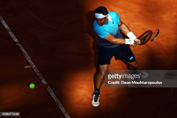 David Ferrer of Spain returns a backhand in his match against Jack Sock of USA during day one of the Internazionali BNL d'Italia 2018 tennis at Foro...