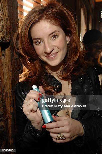 Actress Anneliese Van Der Pol poses with Per-Fekt Beauty at the Hollywood Helping Haiti Golden Globes Celebrity & Charity Lounge at House of Blues...