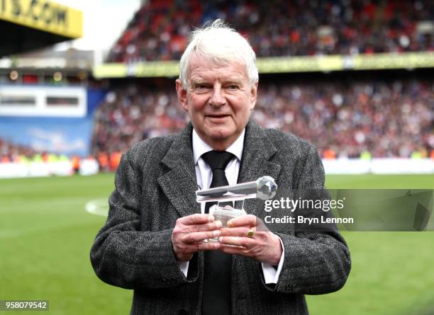 Radio commentator, John Motson recieves an award for his services to commentry after the Premier League match between Crystal Palace and West...