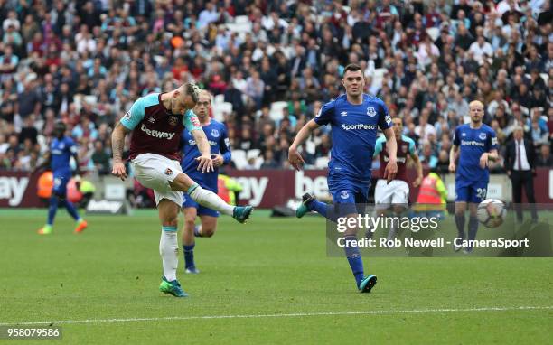 West Ham United's Marko Arnautovic scores his side's second goal during the Premier League match between West Ham United and Everton at London...