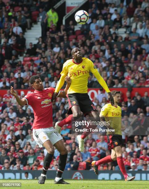 Marcus Rashford of Manchester United in action with Abdoulaye Doucoure of Watford during the Premier League match between Manchester United and...