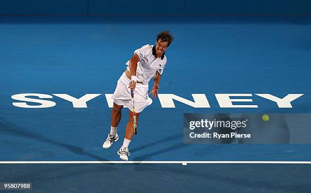 Richard Gasquet of France serves in his men's final match against Marcos Baghdatis of Cyrprus during day seven of the 2010 Medibank International at...