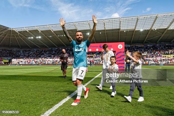 Leon Britton of Swansea City with his family thanks home supporters prior to the game during the Premier League match between Swansea City and Stoke...