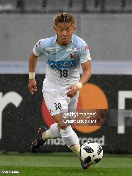 Daiki Suga of Consadole Sapporo in action during the J.League J1 match between FC Tokyo and Consadole Sapporo at Ajinomoto Stadium on May 13, 2018 in...