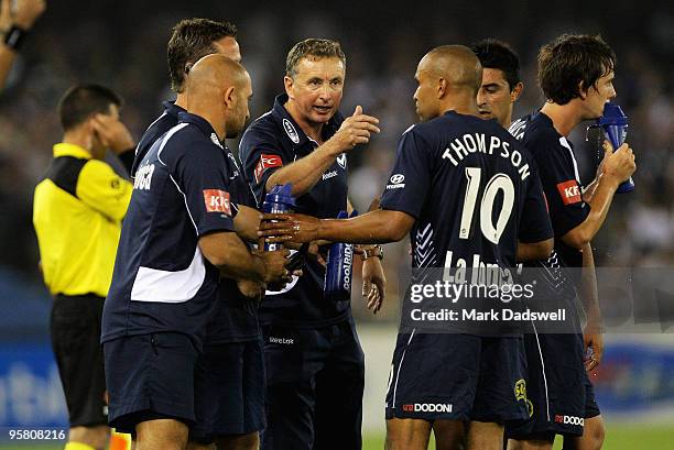 Ernie Merrick coach of the Victory addresses his players during the round 23 A-League match between the Melbourne Victory and the Perth Glory at...